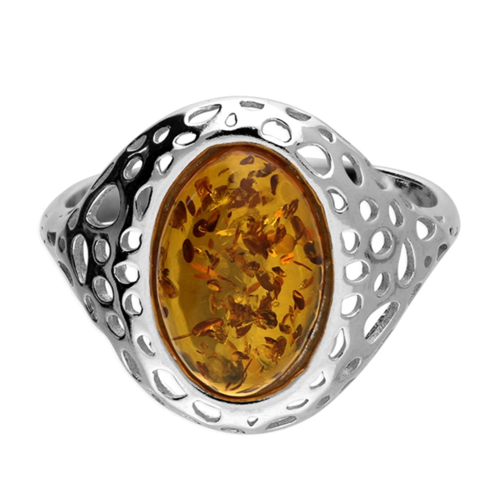 Oval cognac amber with a decorative openwork design on the shoulders