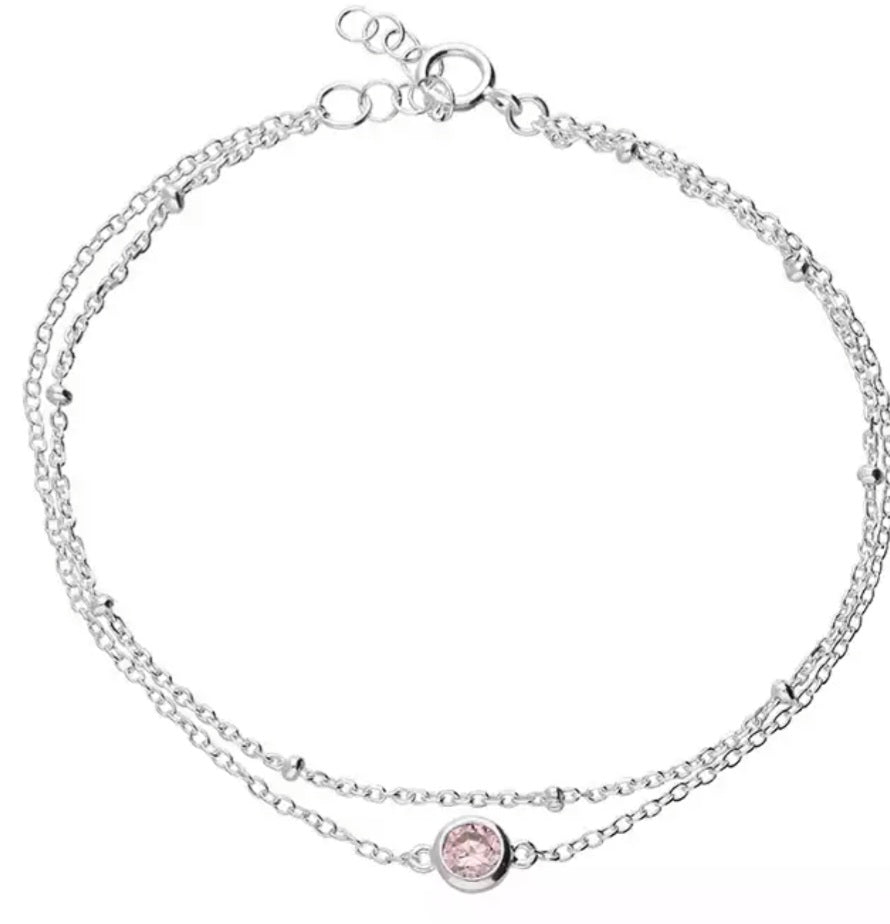Pink cubic zirconia on a double satellite chain