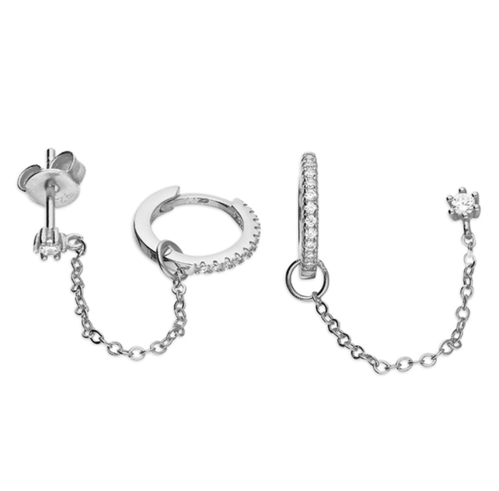 Double piercing asymmetric cubic zirconia hoop and flower stud drop