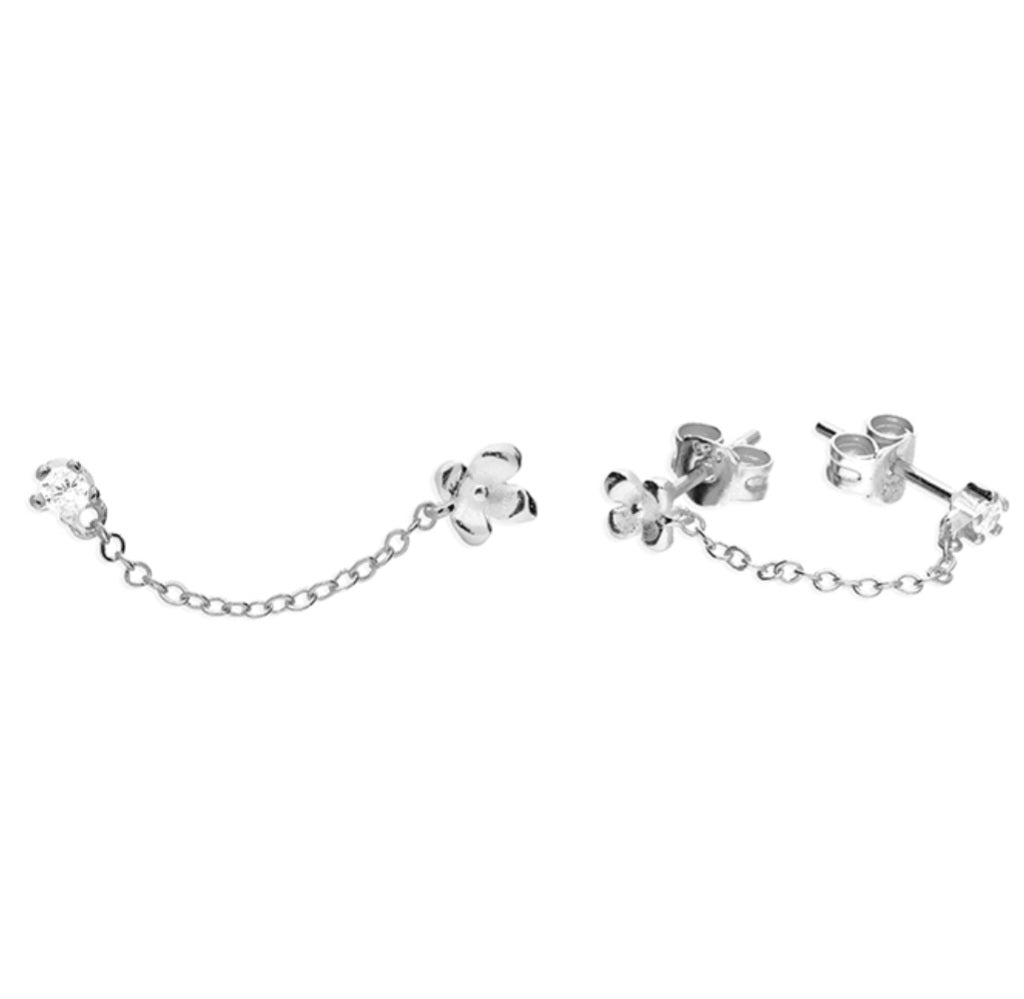 Double piercing asymmetric plain flower and tiny cubic zirconia stud