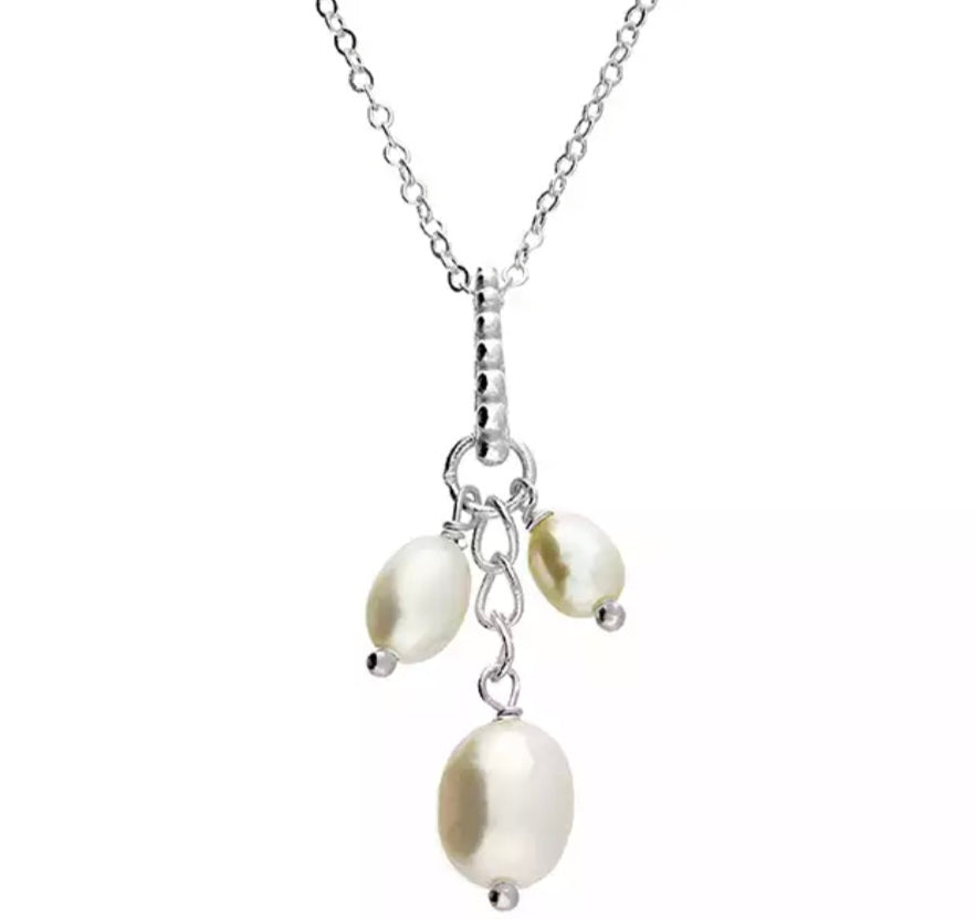 Graduated trio of freshwater pearls on a beaded bar